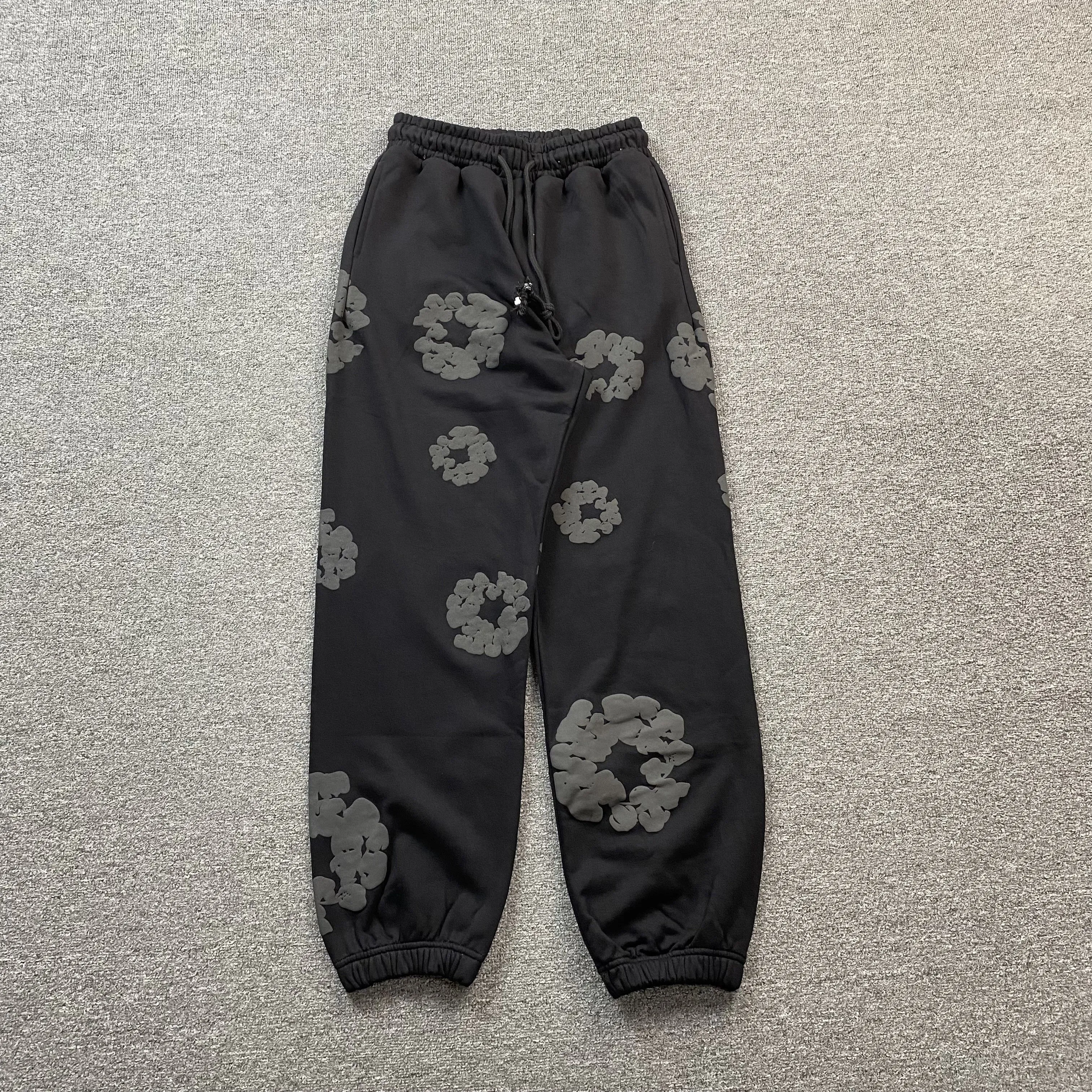 DENIM TEARS COTTON WREATH SWEATPANTS MONOCHROME BLACK